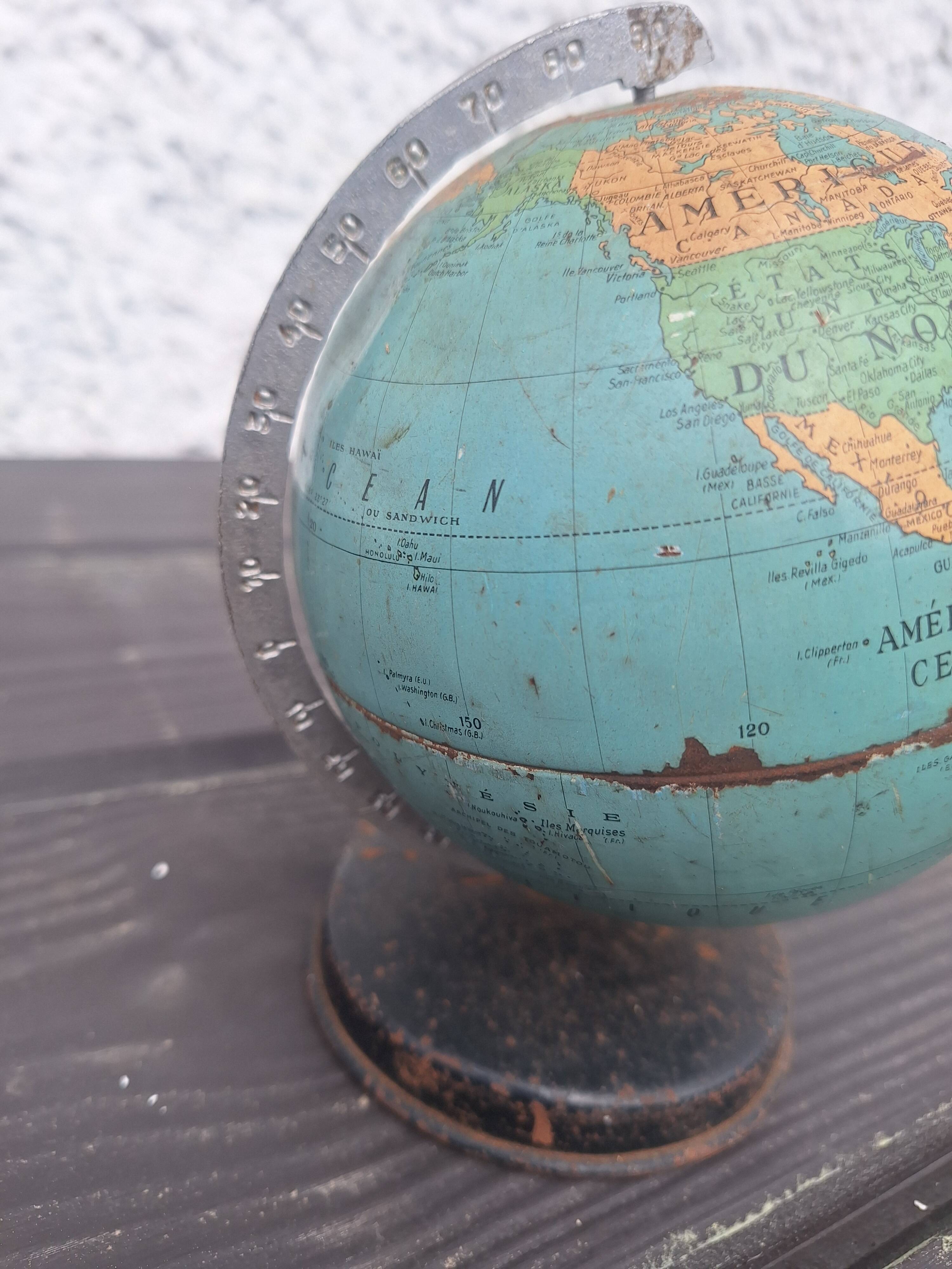Old small metal globe "taride maps"