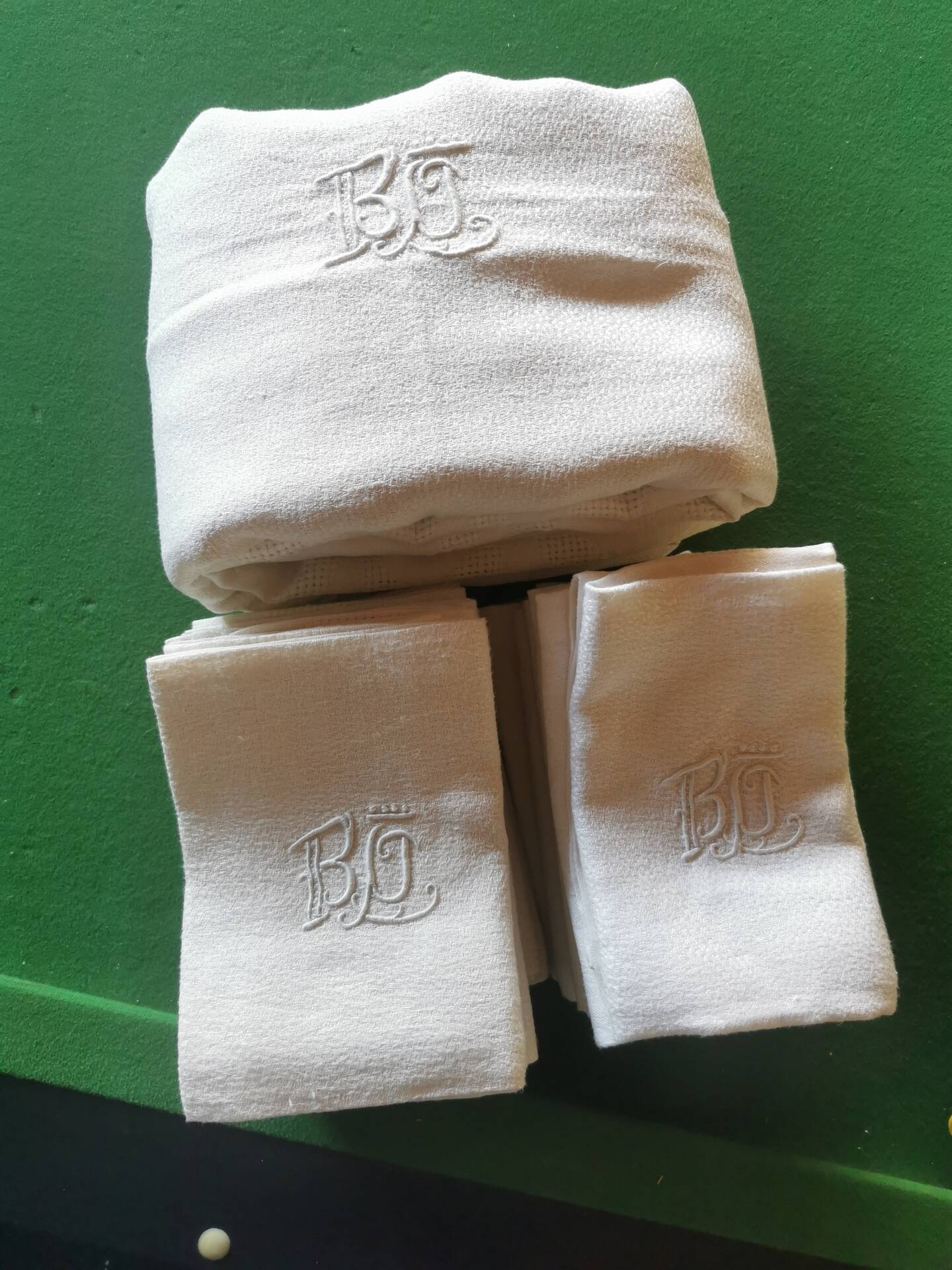Set of 16 table napkins and an old floral damask tablecloth.