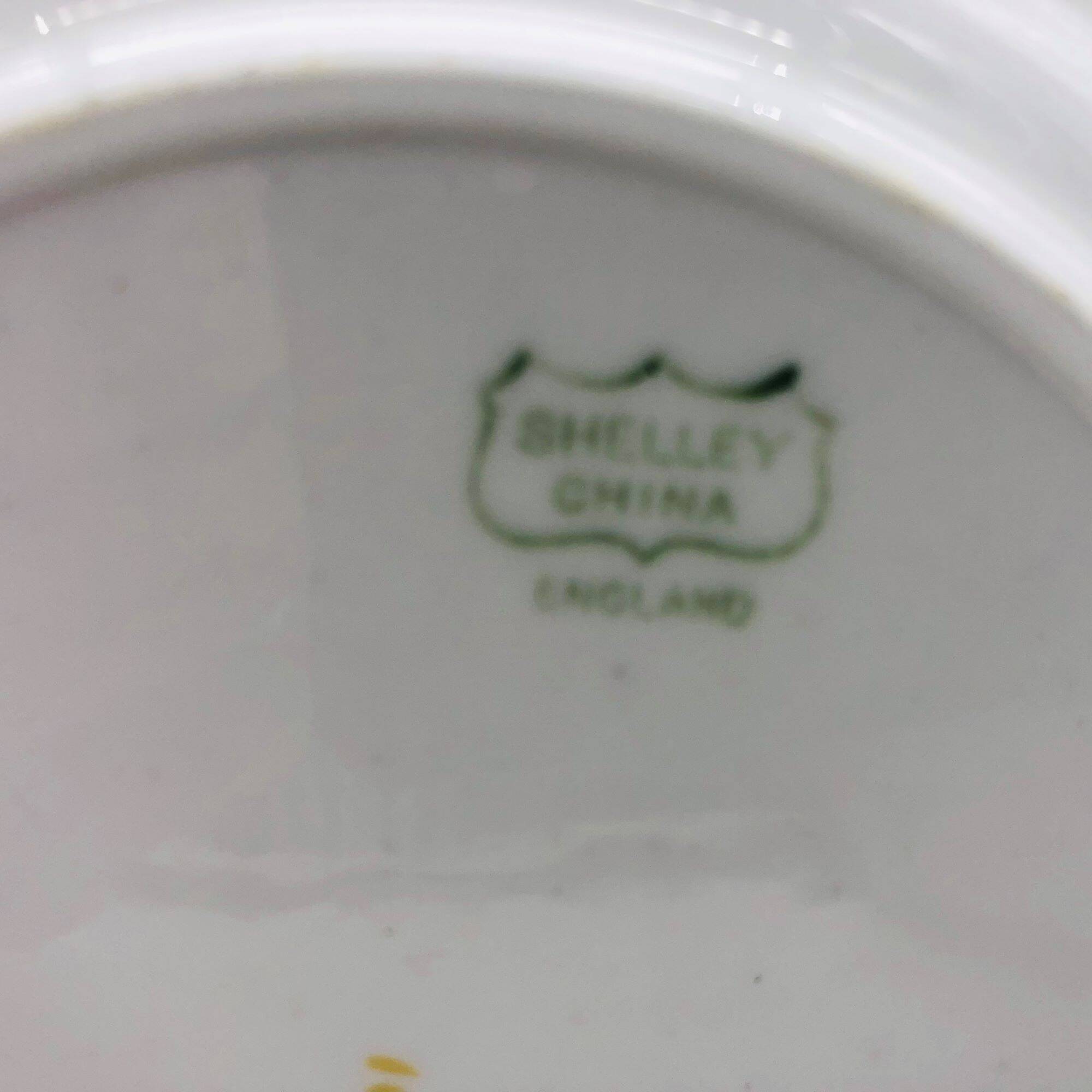 6 Dessert plates and a “Shelley - England” serving dish