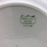 6 Dessert plates and a “Shelley - England” serving dish
