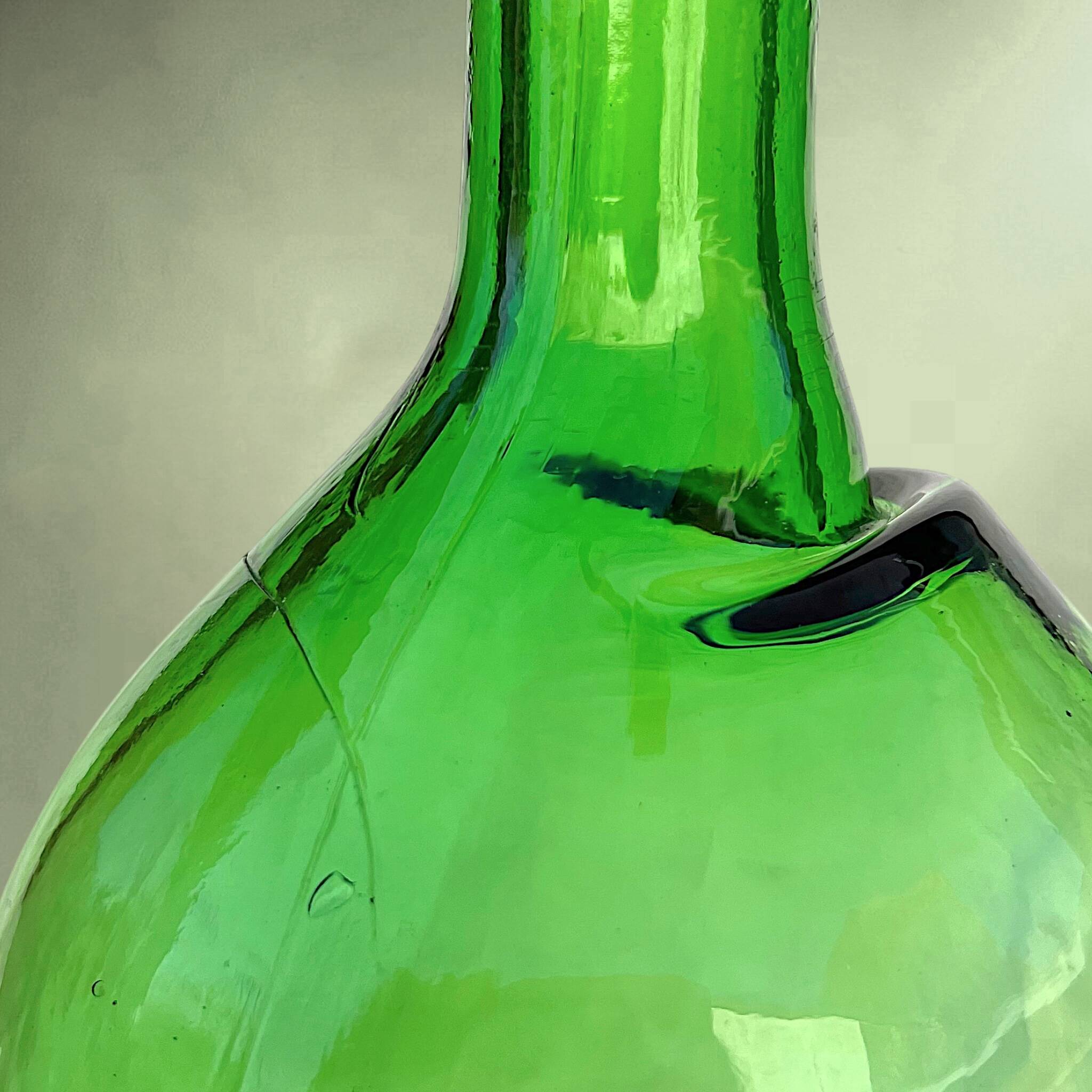 Large antique green glass bottle – early 20th century
