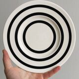 Ceramic plate with black round patterns