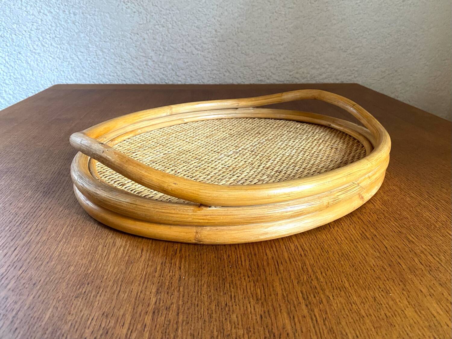 Oval tray made of rattan and bamboo from the 1970s