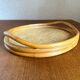 Oval tray made of rattan and bamboo from the 1970s