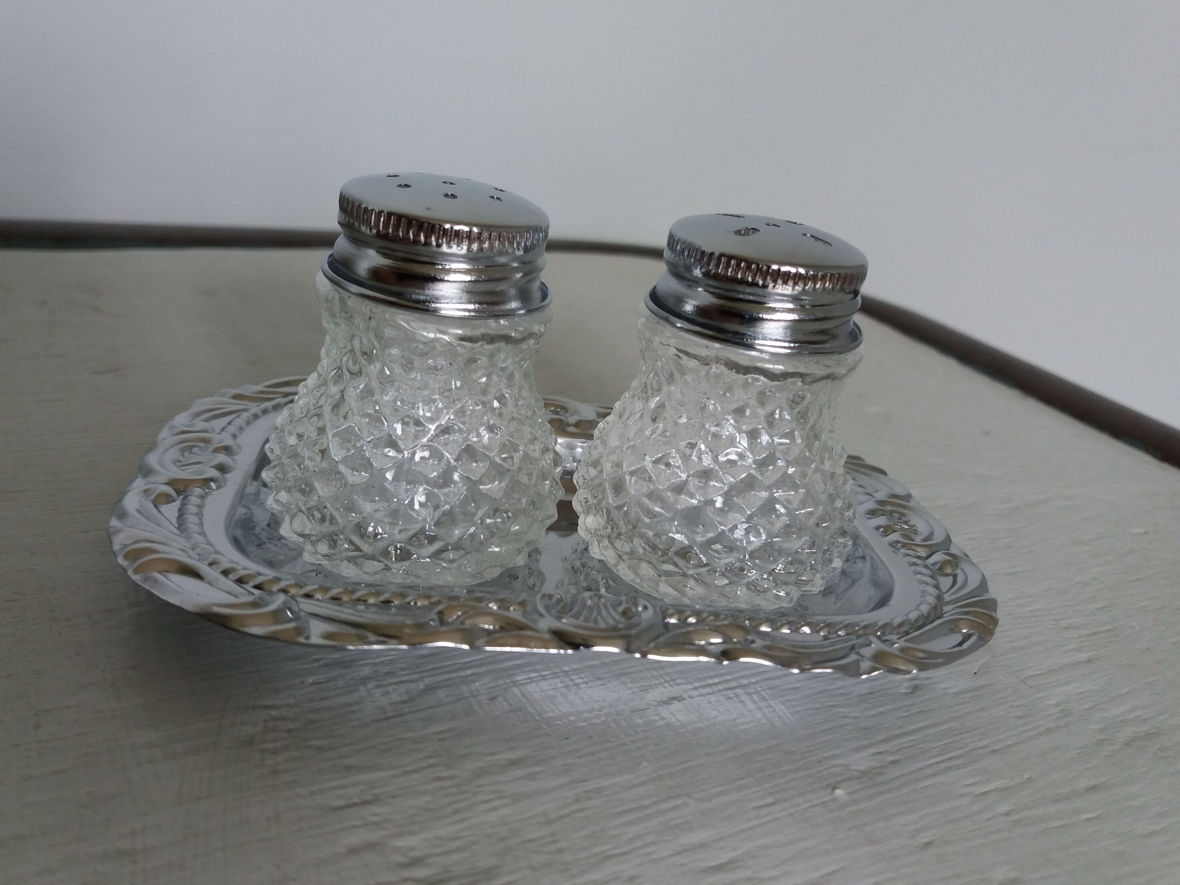 Salt shaker and pineapple shaped pepper