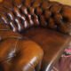 Chesterfield club armchair in patinated chestnut coloured leather