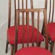 Set of 4 red dining chairs by Antonin Suman for Interier Praha.