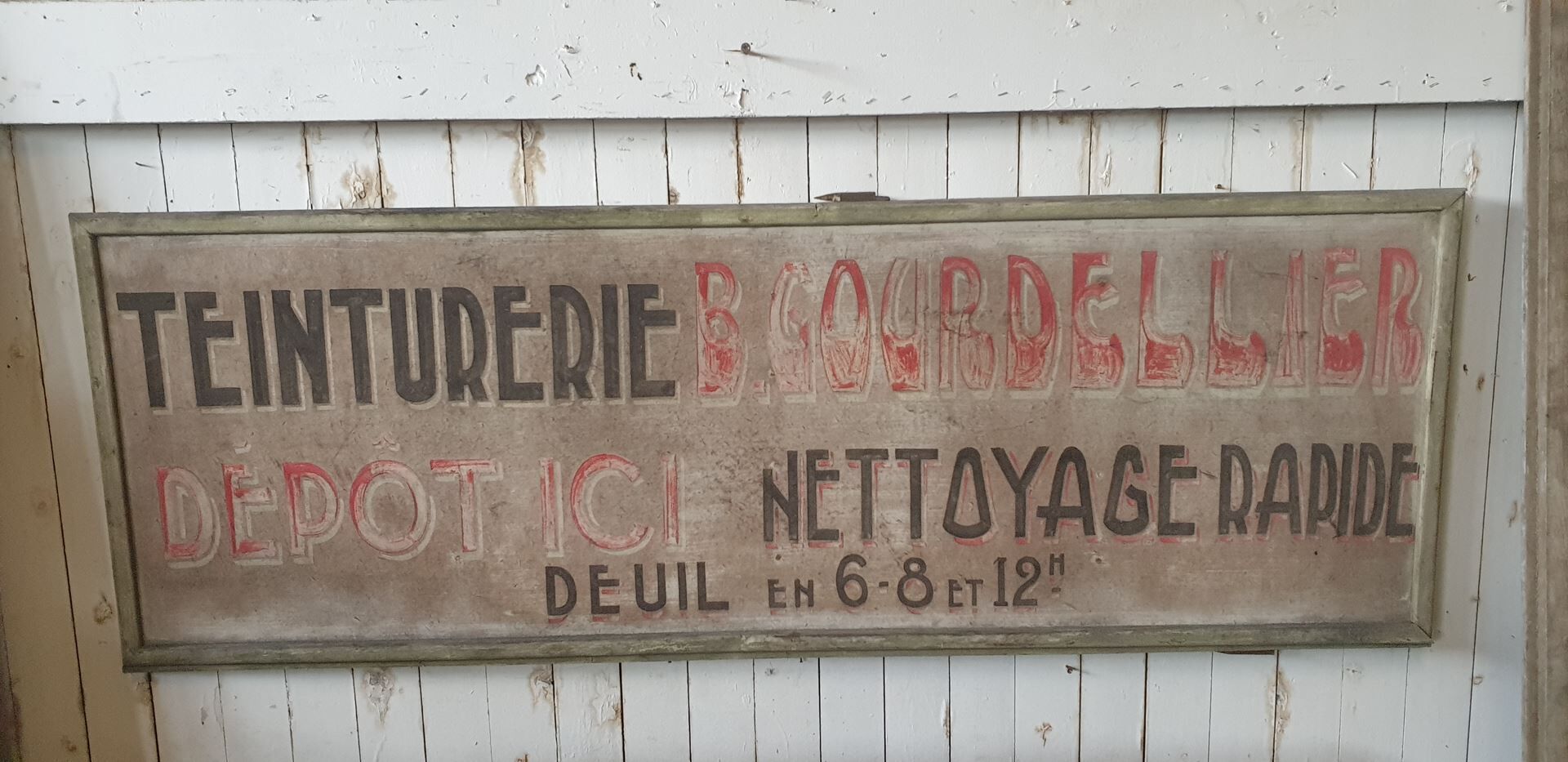 former big wooden advertising sign