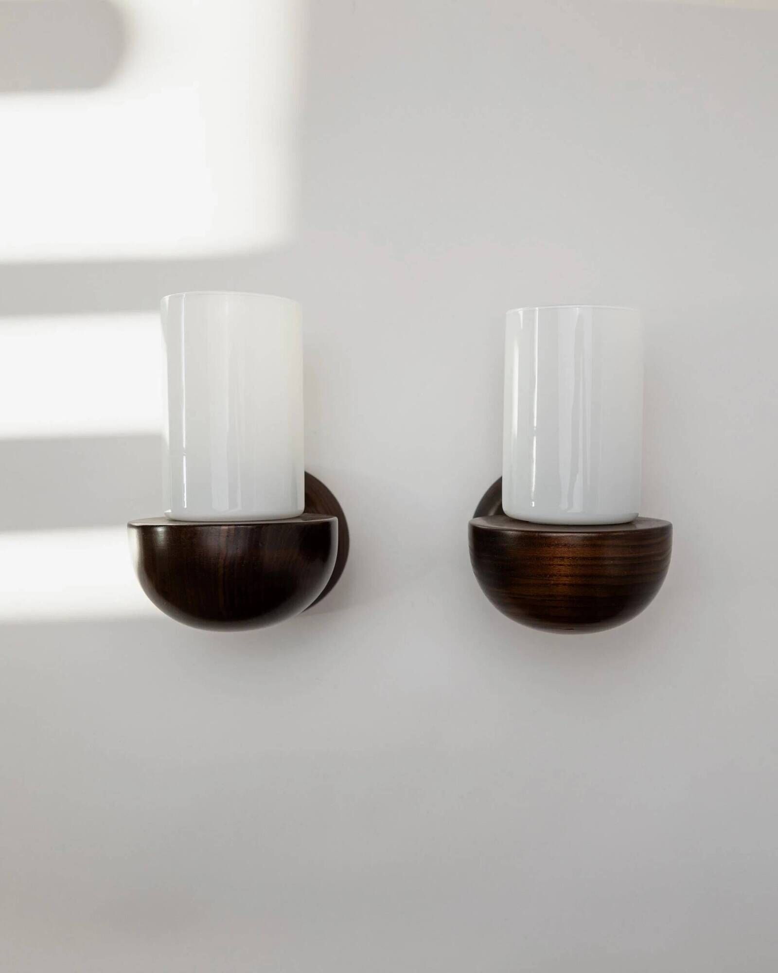 Vintage wall sconces from the 1960s, set of 2, dark wood with white glass shades, Mid-Century Modern lighting, sculptural wall sconces.