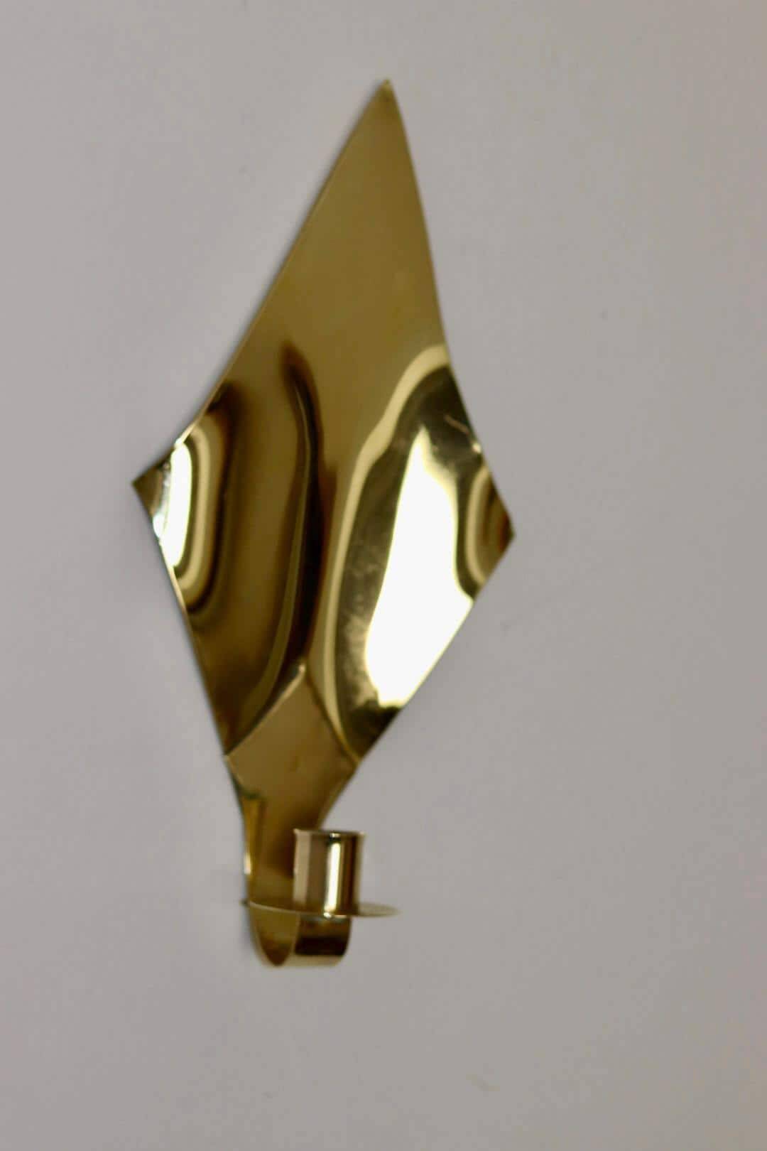Pair of Swedish brass wall sconces from the mid-century.
