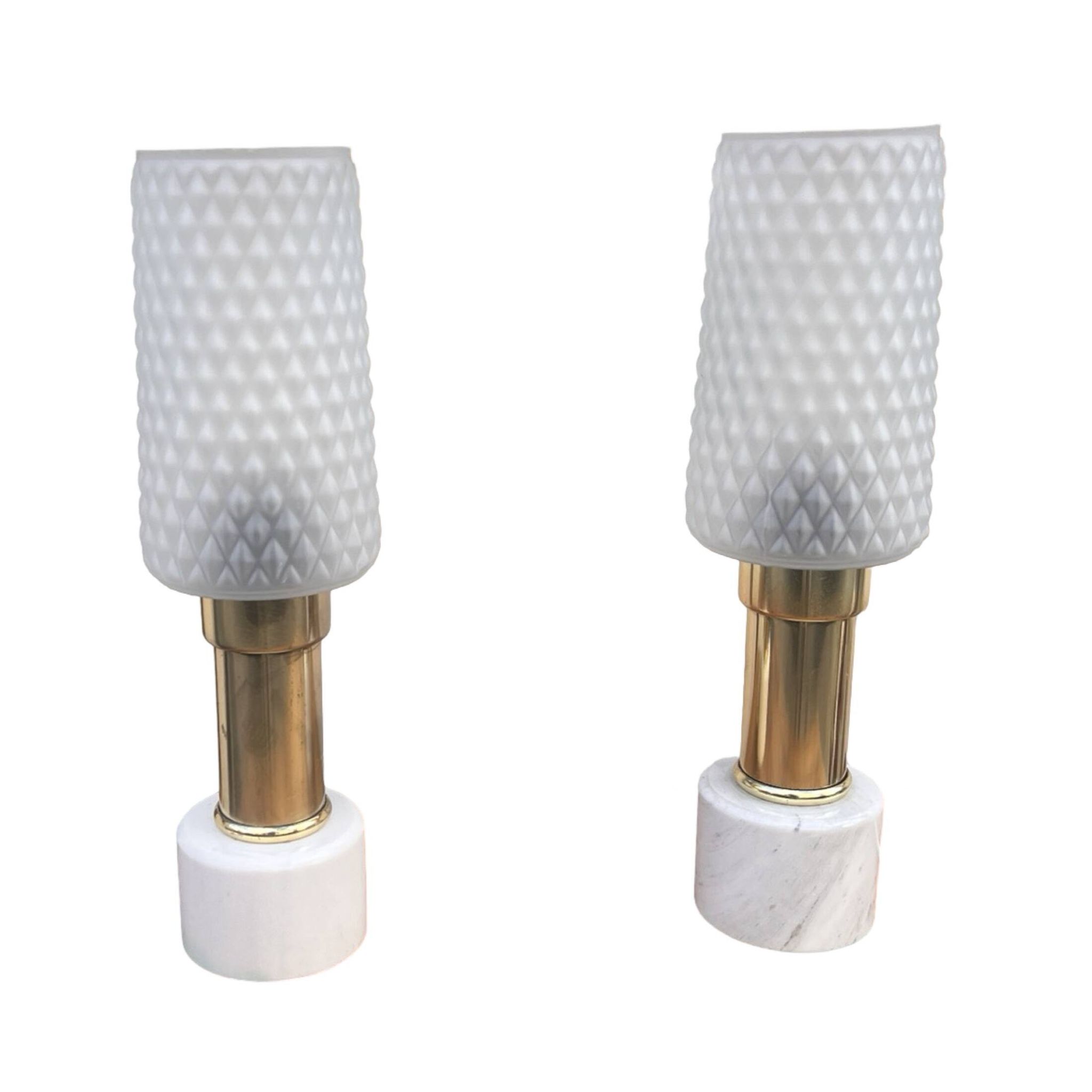 A pair of bedside lamps with a marble base, VEB Narva Leuchtenbau Lengefeld Germany, 1960s.