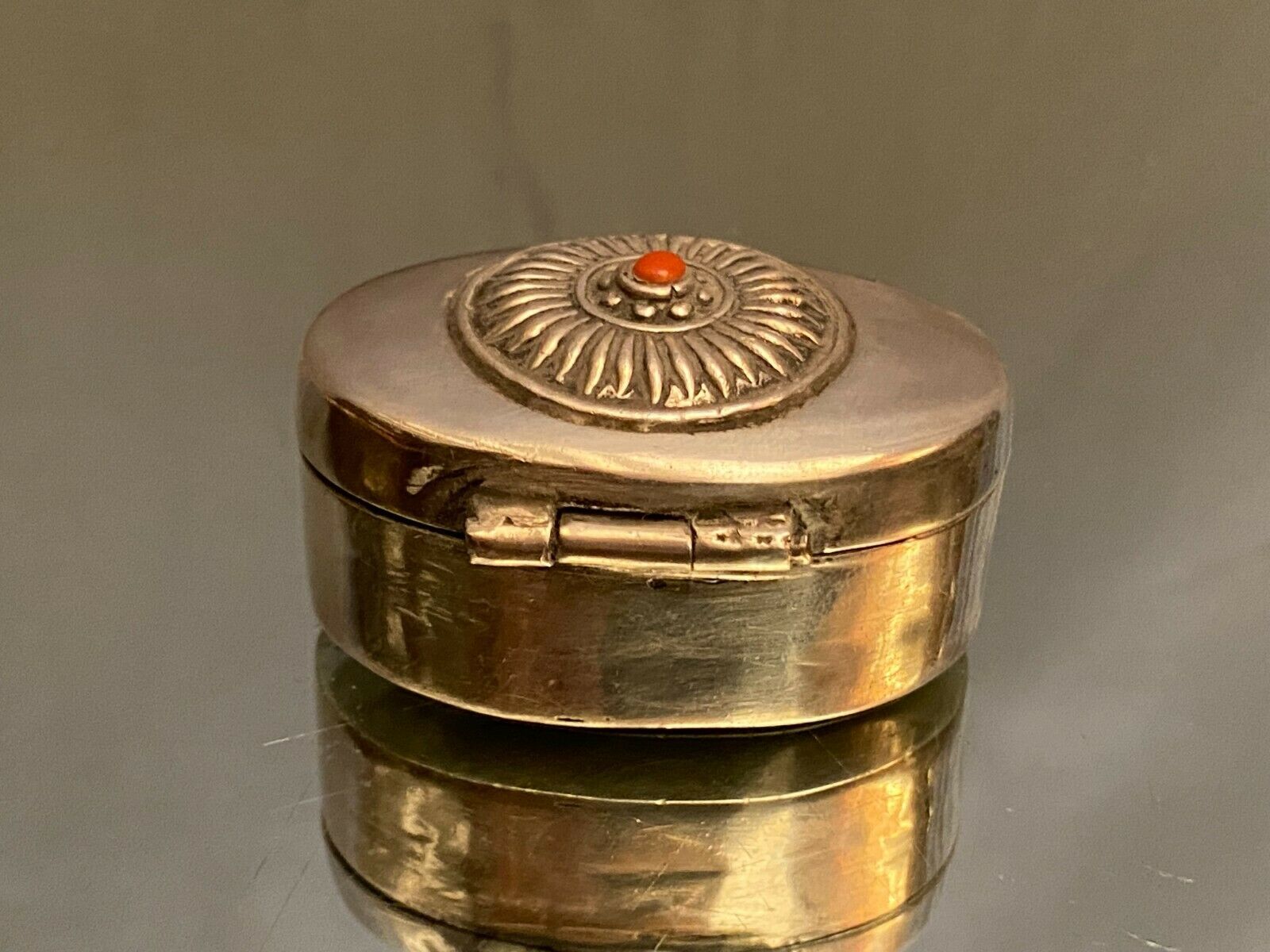 Oval silver box enhanced with coral Middle East India Asia