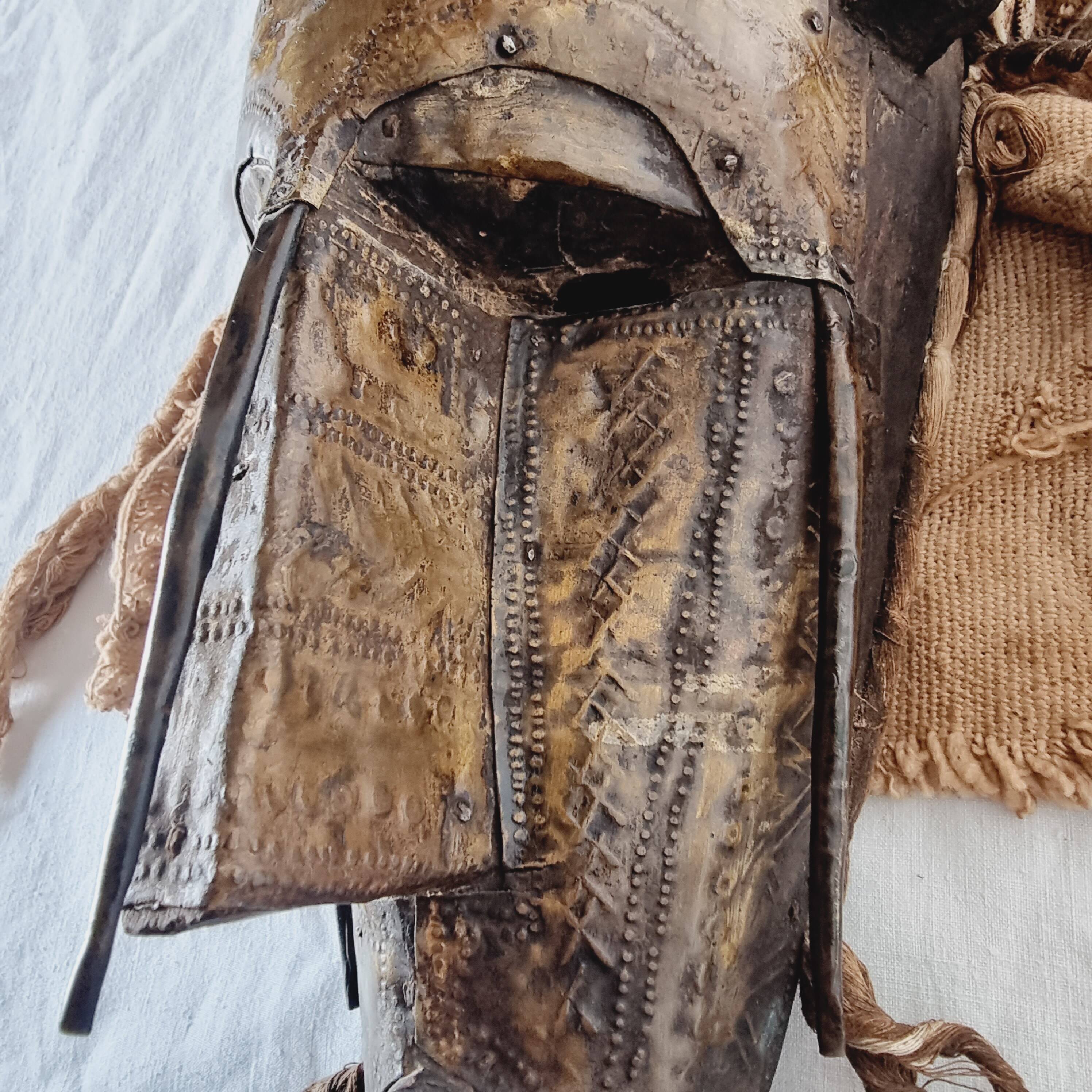 African mask from Mali from the N'Tomo tribe of Marka covered in chiseled brass