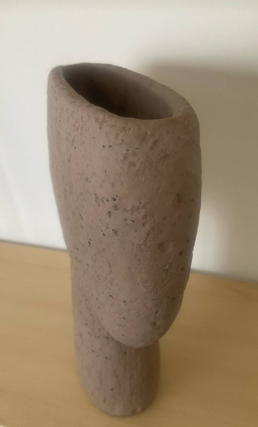 Vintage vase made of raw clay