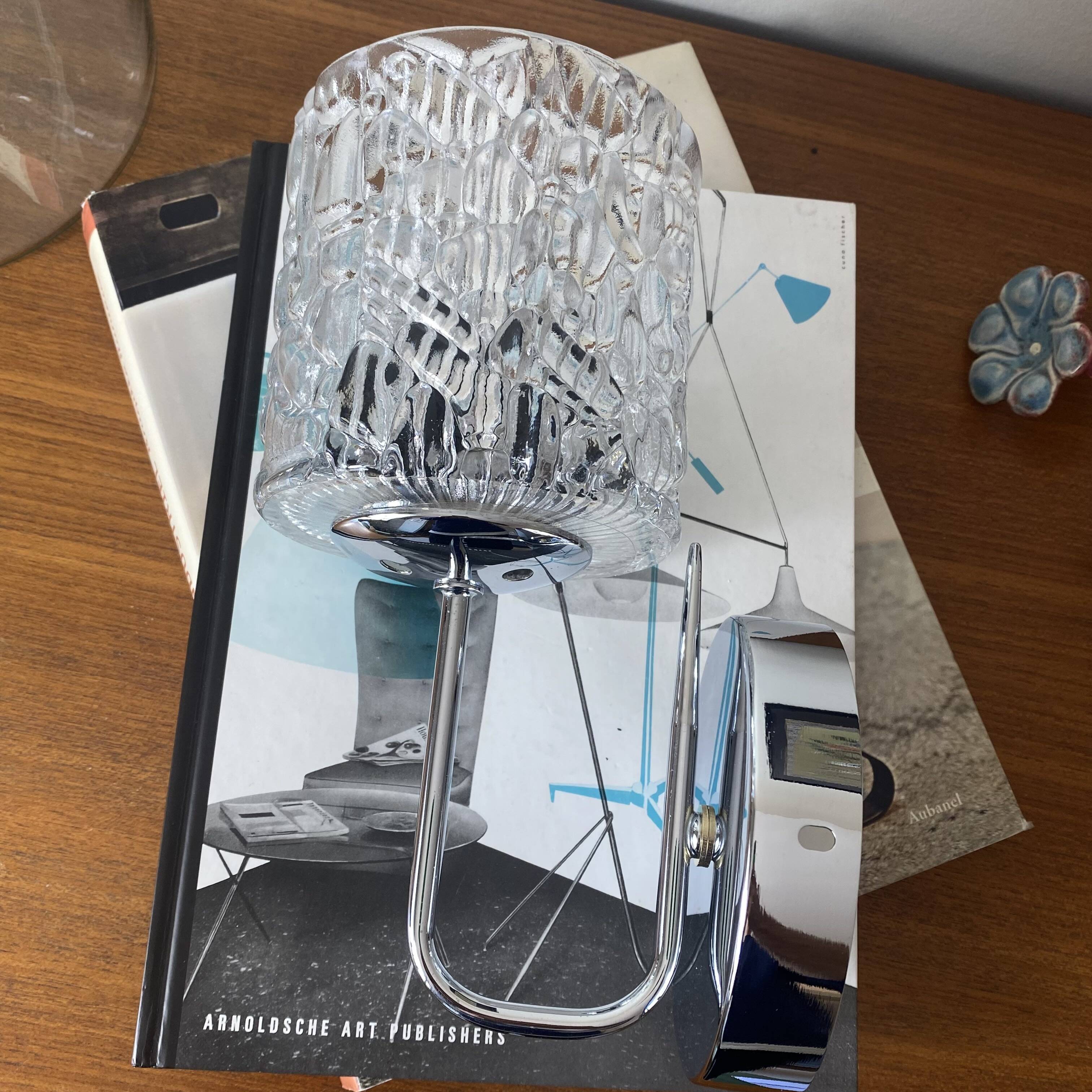 Swan neck wall light in stainless steel, thick glass shade, stainless steel rose.