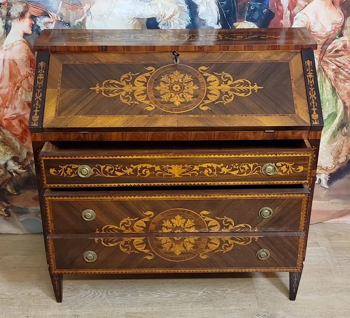 Louis XV style writing desk commode with drop-down front, made of precious wood.