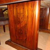 Modernist dining table in rosewood veneer.