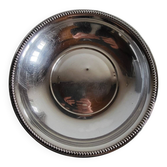 Shallow round metal plate with pearl bead decoration.