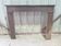 Country-style fireplace surround - stained poplar - late 19th century