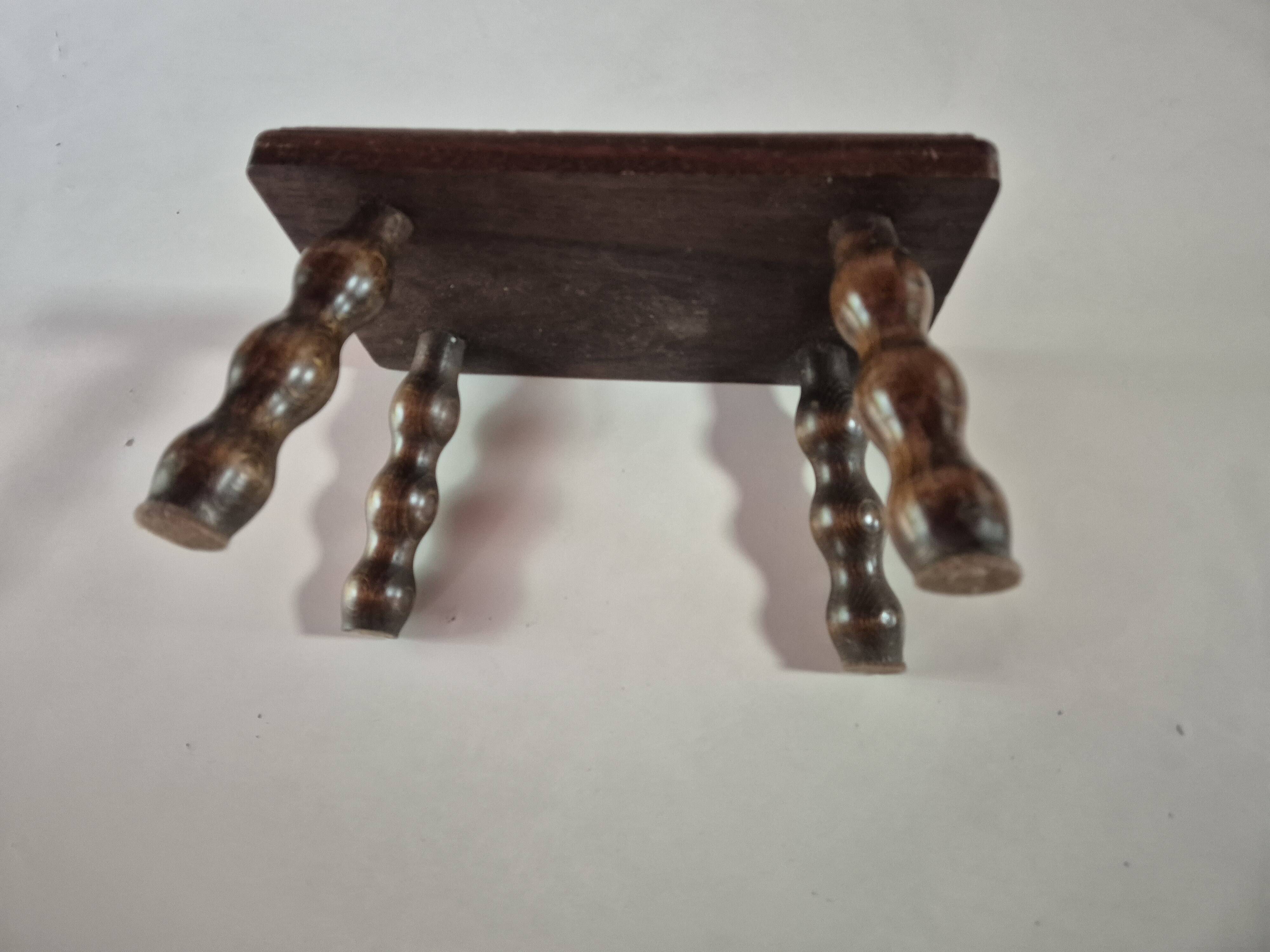 Mini footstool with vintage twisted legs.