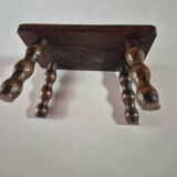Mini footstool with vintage twisted legs.