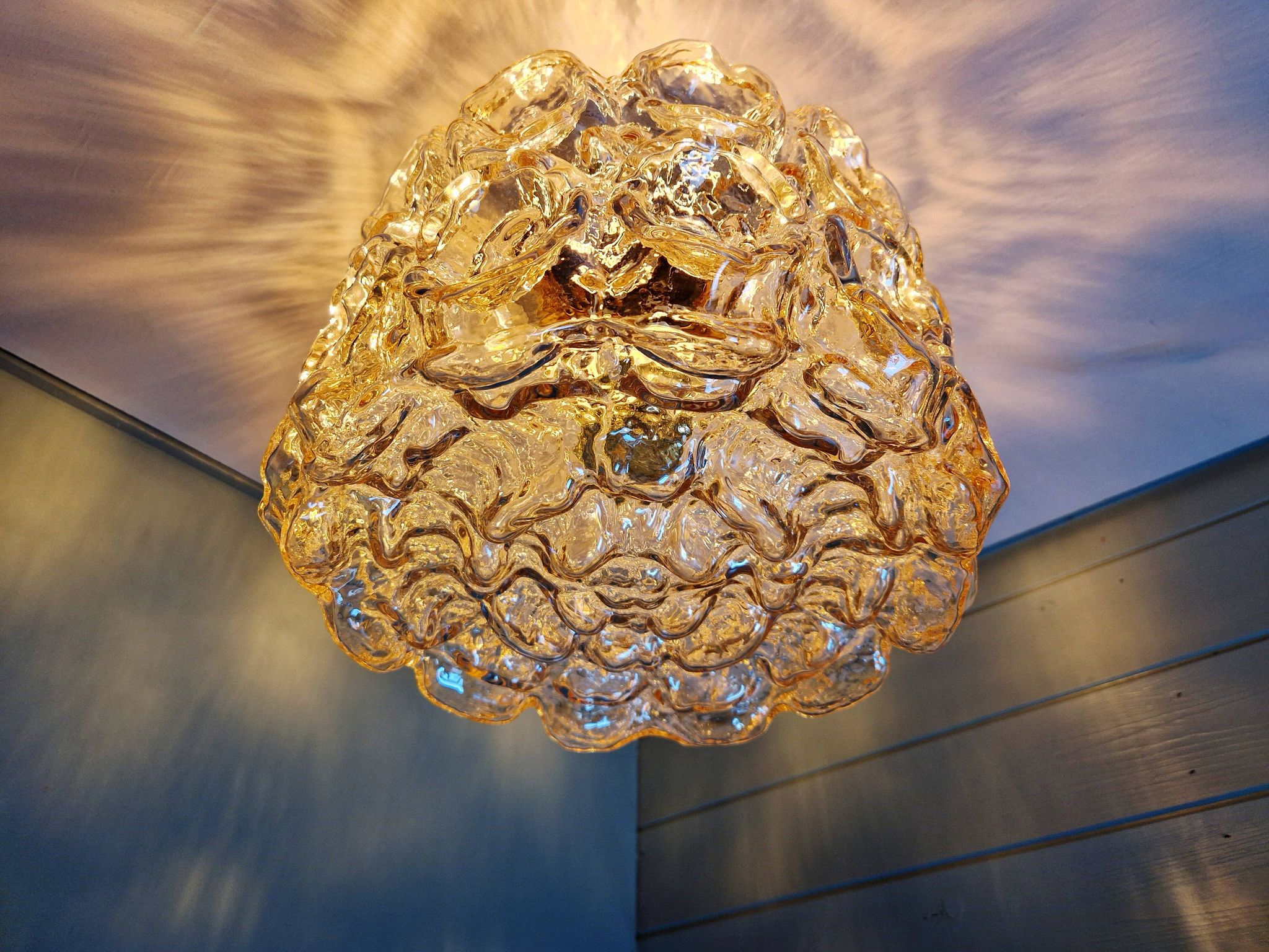 Brass and amber textured glass ceiling light, design by Helena Tynell, Limburg.
