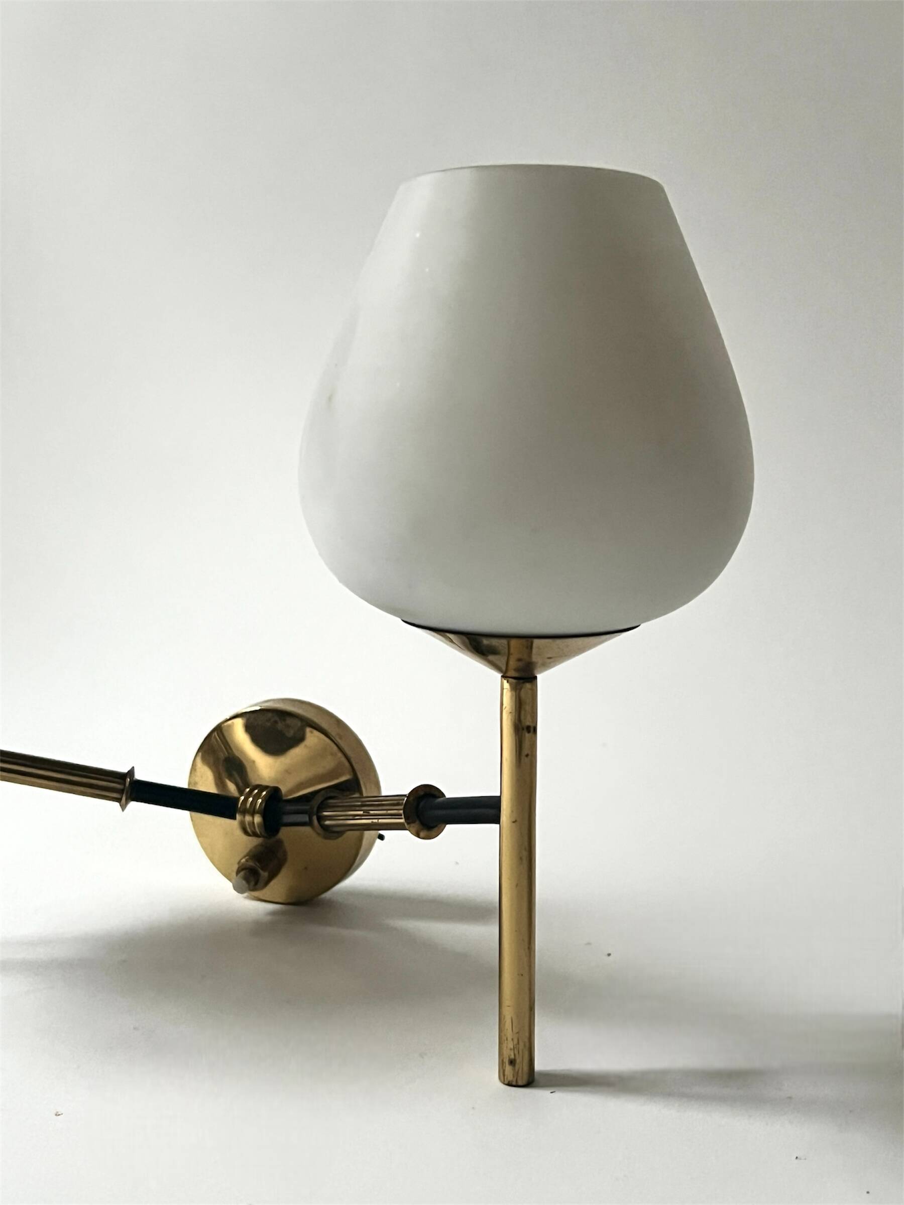2 double wall lights in brass and white opaline glass, Arlus design 1950