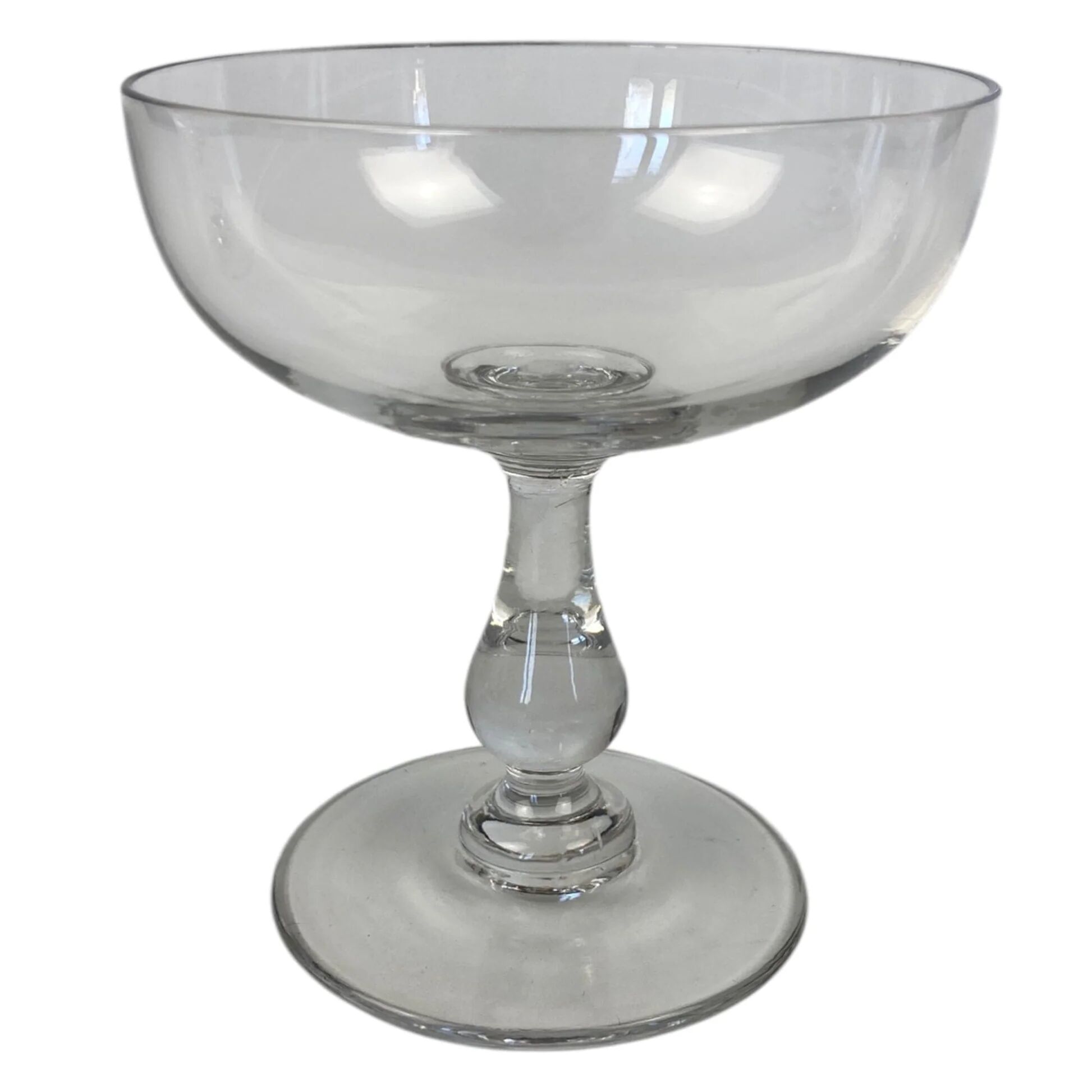4 Baccarat crystal champagne coupes in a gondola shape.