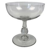 4 Baccarat crystal champagne coupes in a gondola shape.
