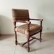Ancien fauteuil "caqueteuse" de style Louis XIII