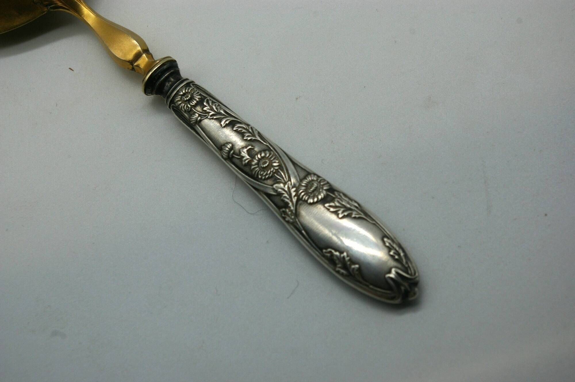 Cream Strawberry Scoop Art Nouveau floral decoration - Minerva filled silver handle Condition: --