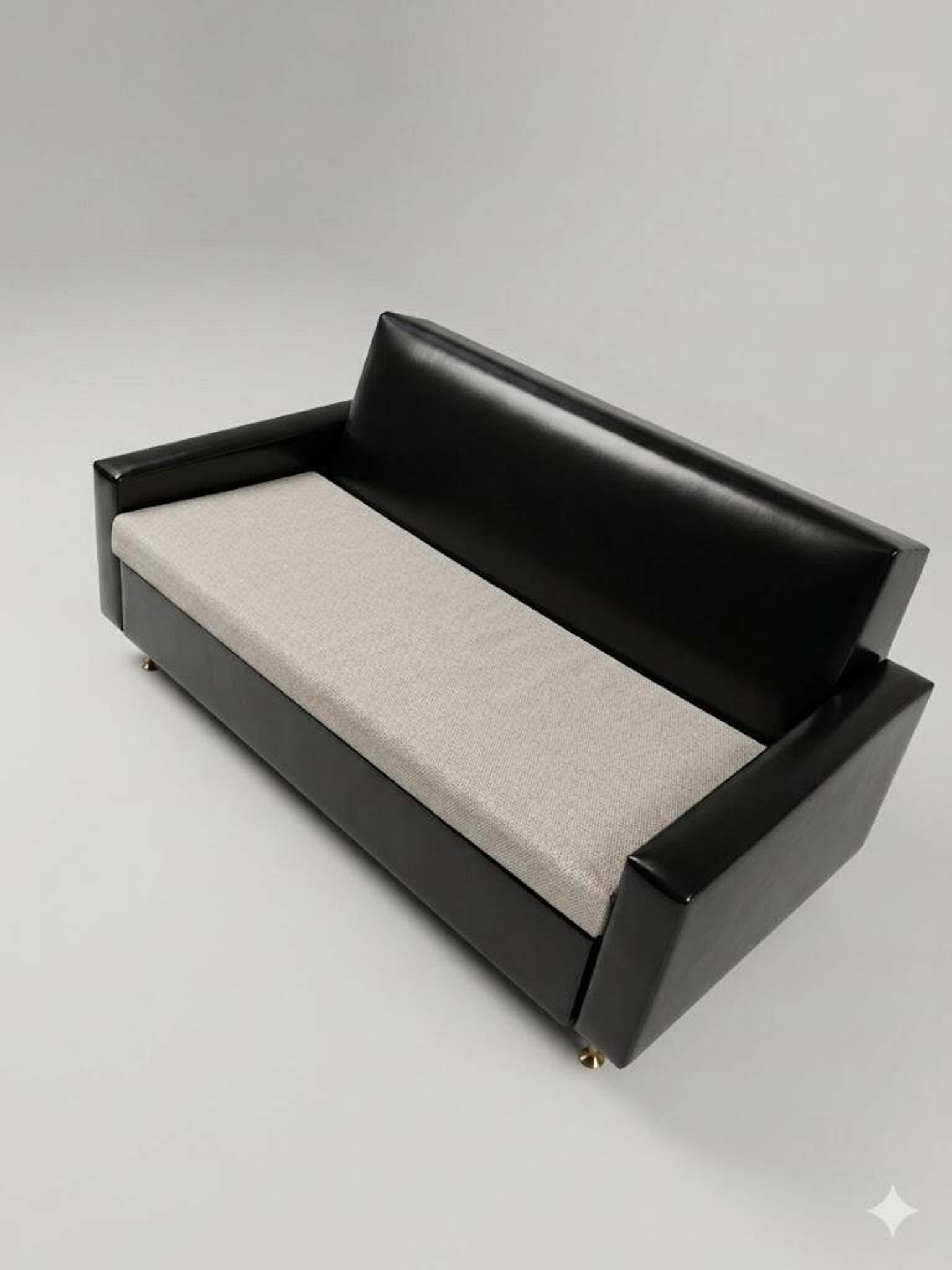 Convertible 2-seater sofa in black faux leather, 70s-80s.