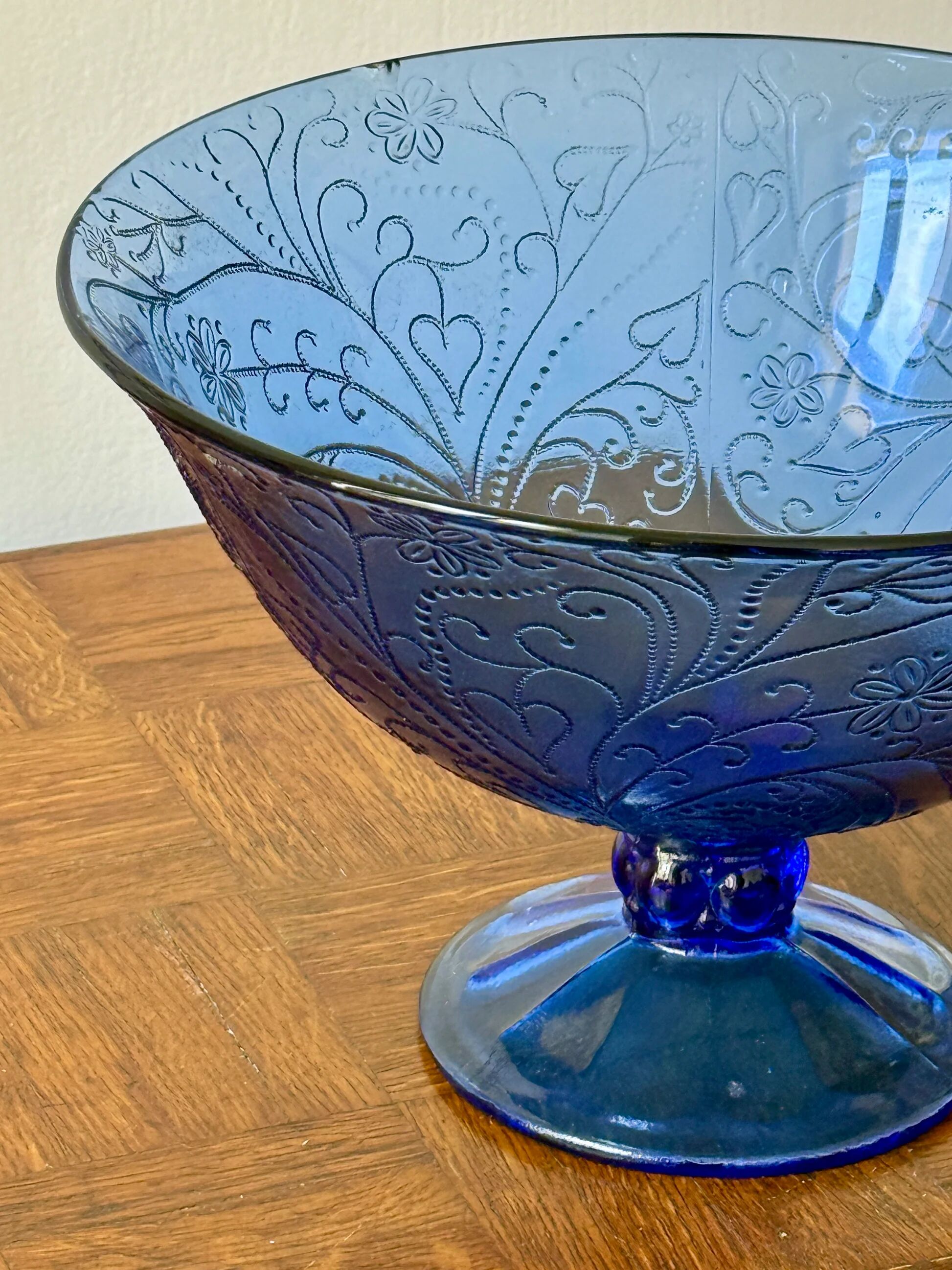 Bluish glass fruit bowl
