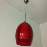 Pair of conical pendant lights in red tinted glass