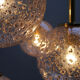Four gold fleck globe pendants by Doria Germany