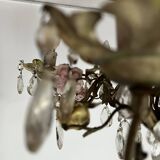 Chandelier with a floral porcelain decoration and pendants