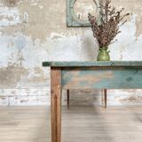 Vintage farm table with spindle legs.