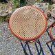 3 wooden bar stools with caning