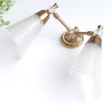 Pair of wall sconces in gold metal and plexiglass, 50 years