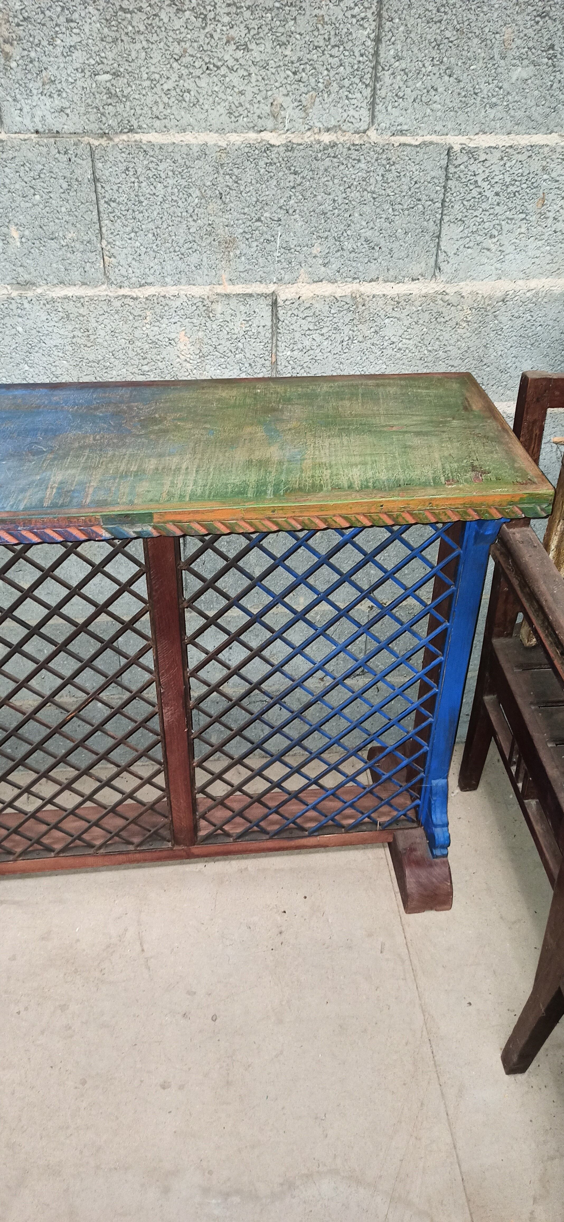 Colorful old standing eat with cast iron grill
