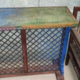 Colorful old standing eat with cast iron grill