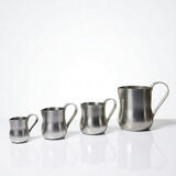 Set of 4 vintage bar measures in brushed stainless steel from the 60s-70s.