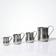 Set of 4 vintage bar measures in brushed stainless steel from the 60s-70s.