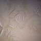 Antique embroidered linen sheet with a monogram.