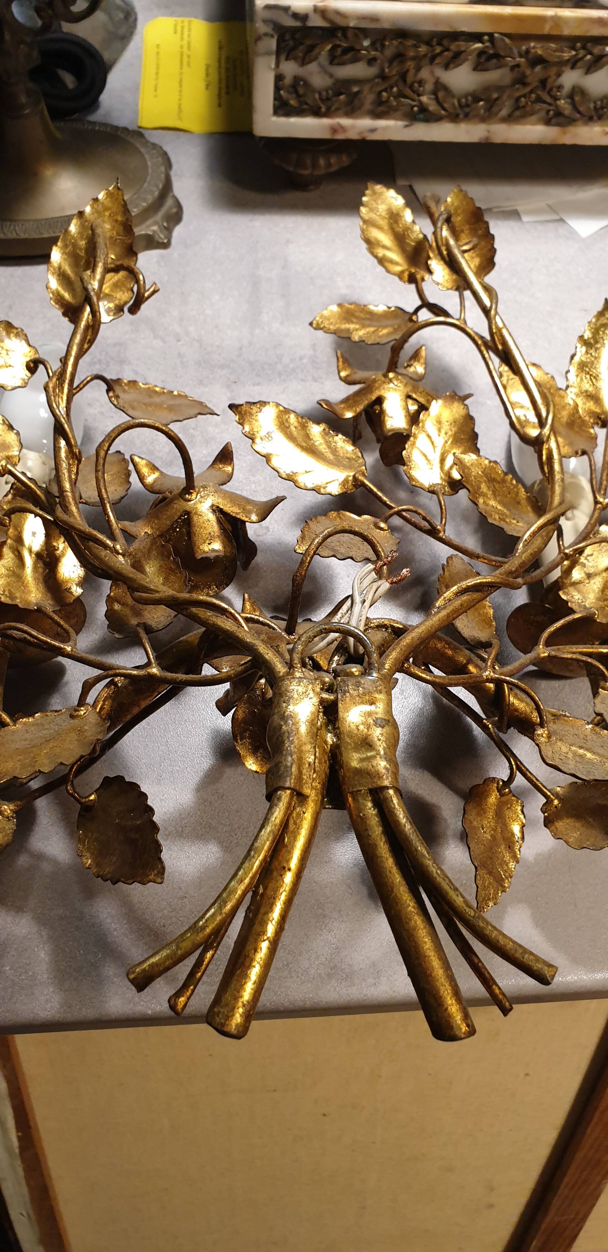 Pair of gold metal wall lights