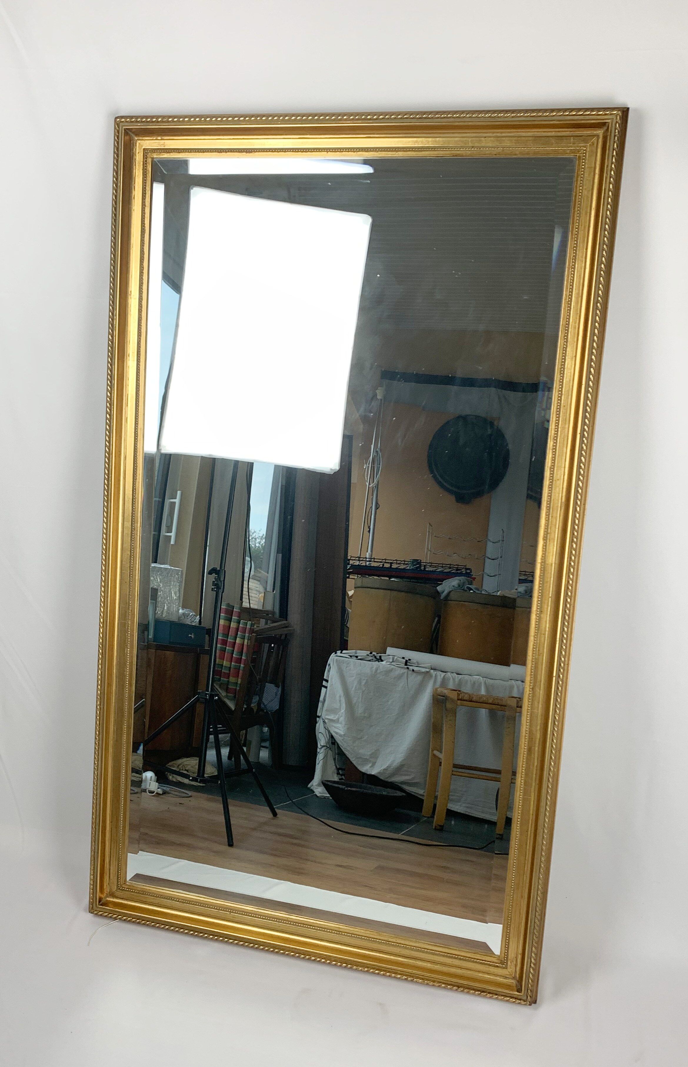 Beveled mirror gilded leaf XXth, 142x82 cm