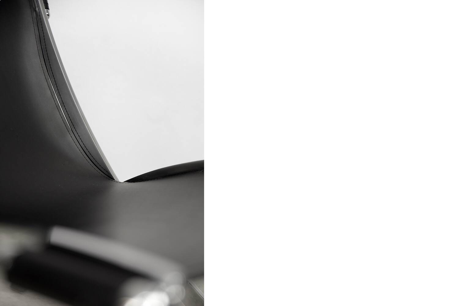 Vintage minimalist chair in Italian leather, 1980s.