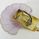 Wall wall lamp shell in pink scribbled glass, gilded metal and brass. Year 70