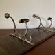 Patinated wood and metal coat rack from the 1950s.