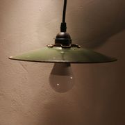 Green enameled sheet suspension